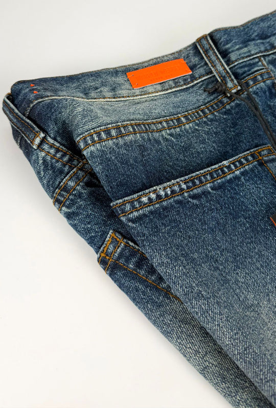 Jeans Uomo slim cropped con piccole abrasioni