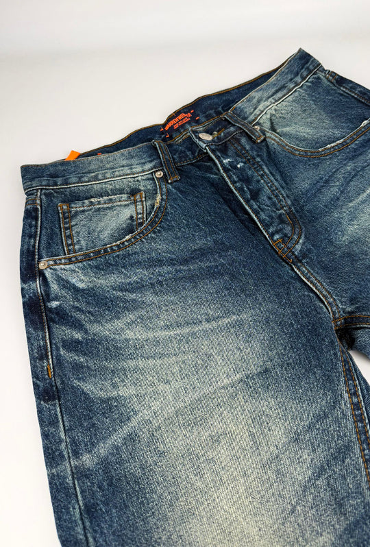 Jeans Uomo slim cropped con piccole abrasioni