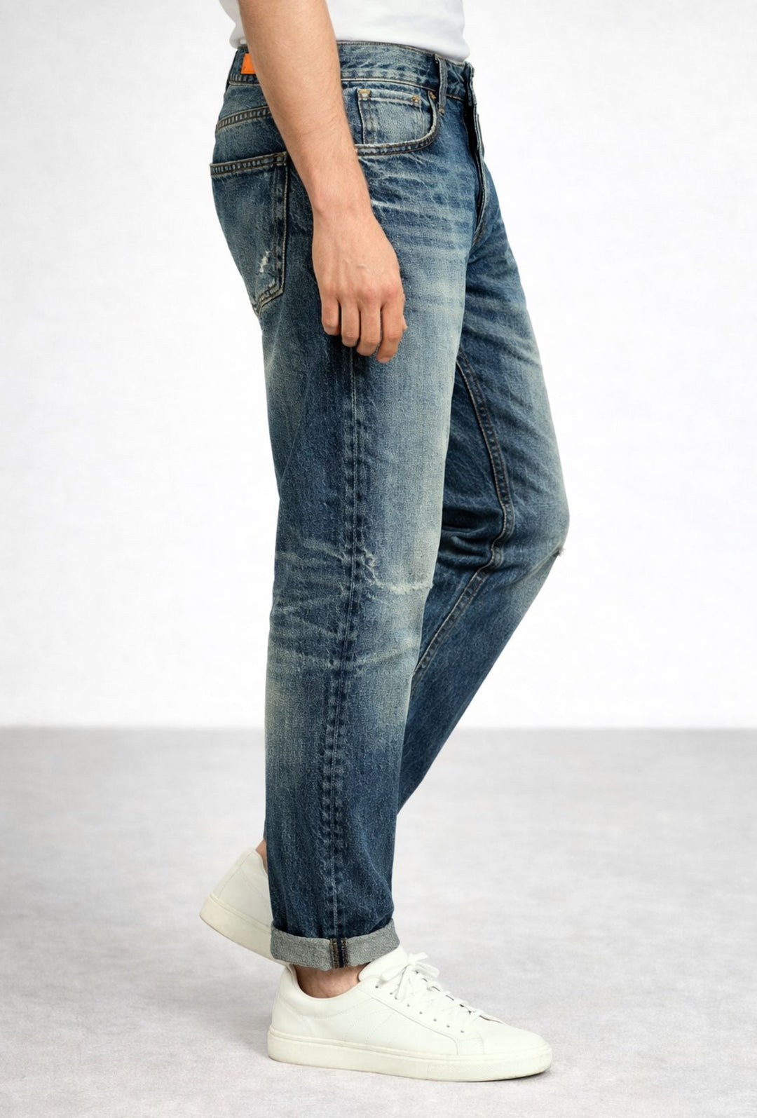 Jeans Uomo slim cropped con piccole abrasioni