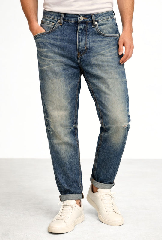 Jeans Uomo slim cropped con piccole abrasioni