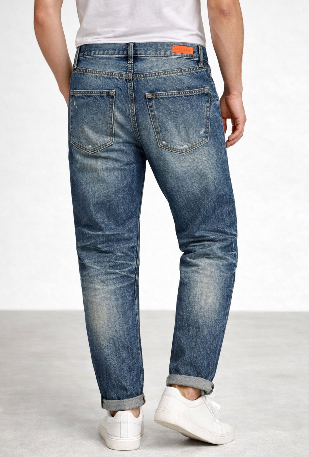 Jeans Uomo slim cropped con piccole abrasioni