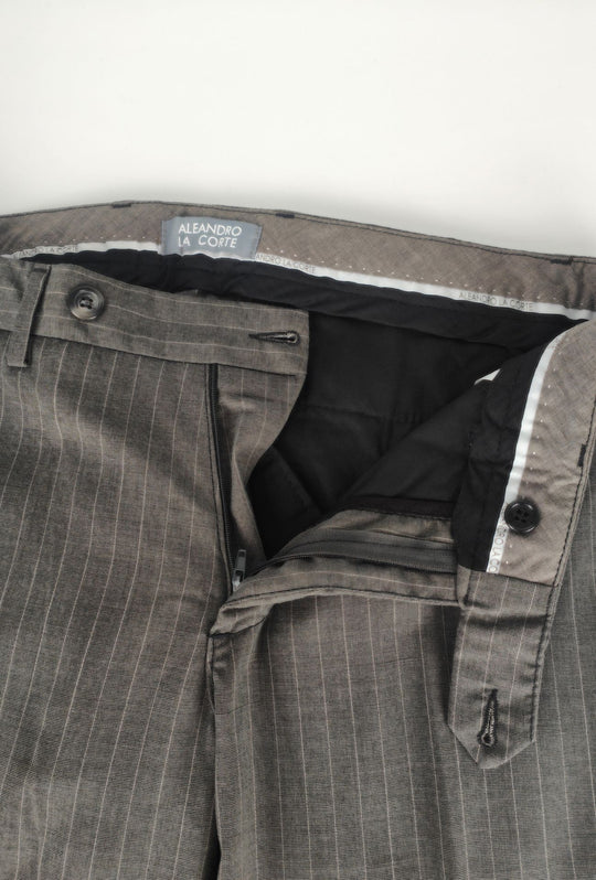 Pantaloni uomo eleganti con tasca America, risvolto e abbottonatura allungata- GRIGIO GESSATO