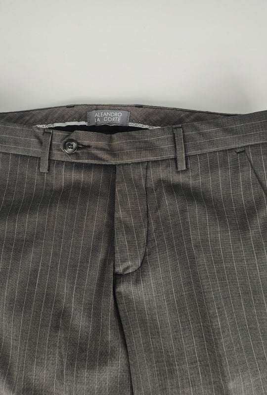 Pantaloni uomo eleganti con tasca America, risvolto e abbottonatura allungata- GRIGIO GESSATO