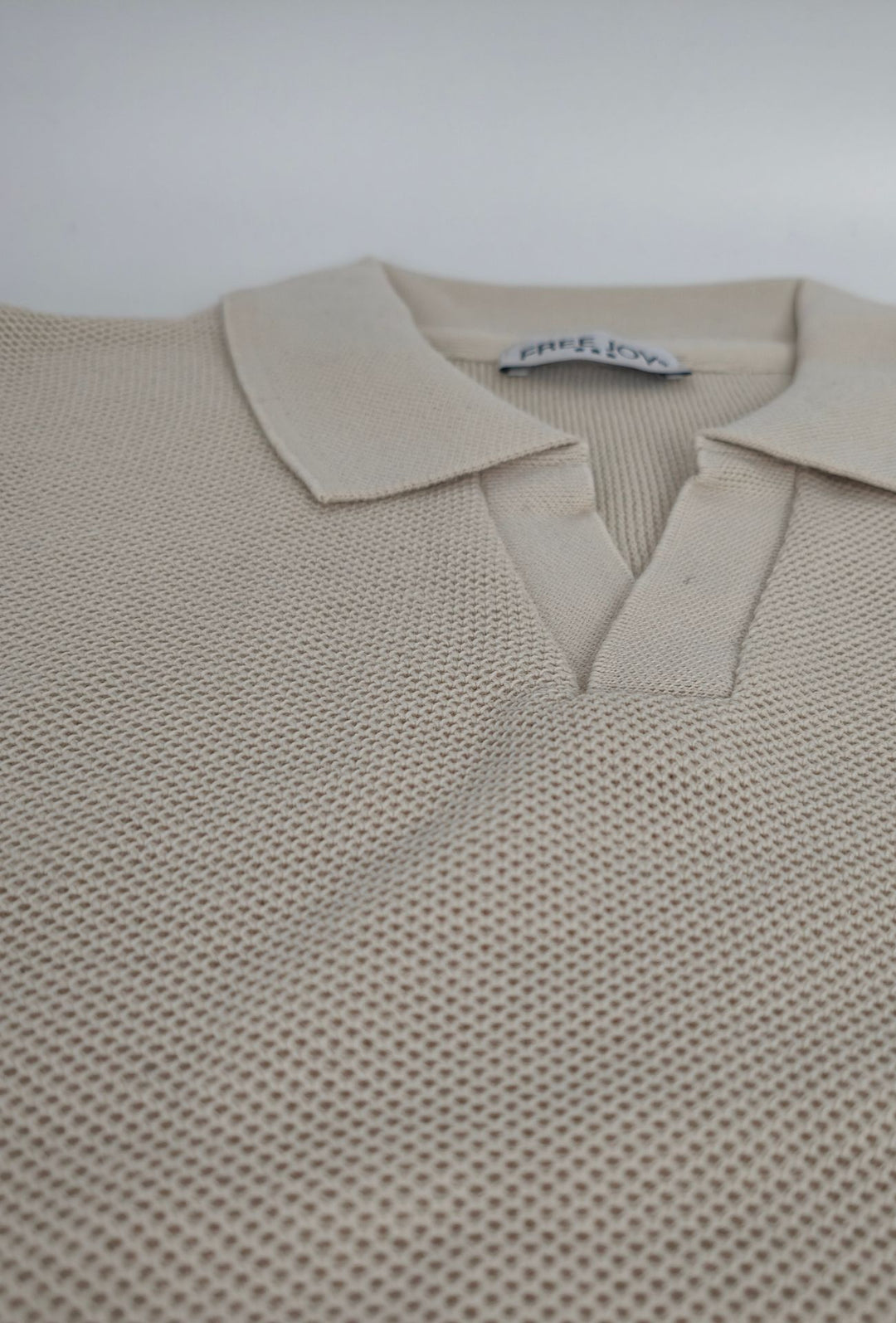 Polo uomo Manica Lunga con scollo Derby microtrama in rilievo- CREMA