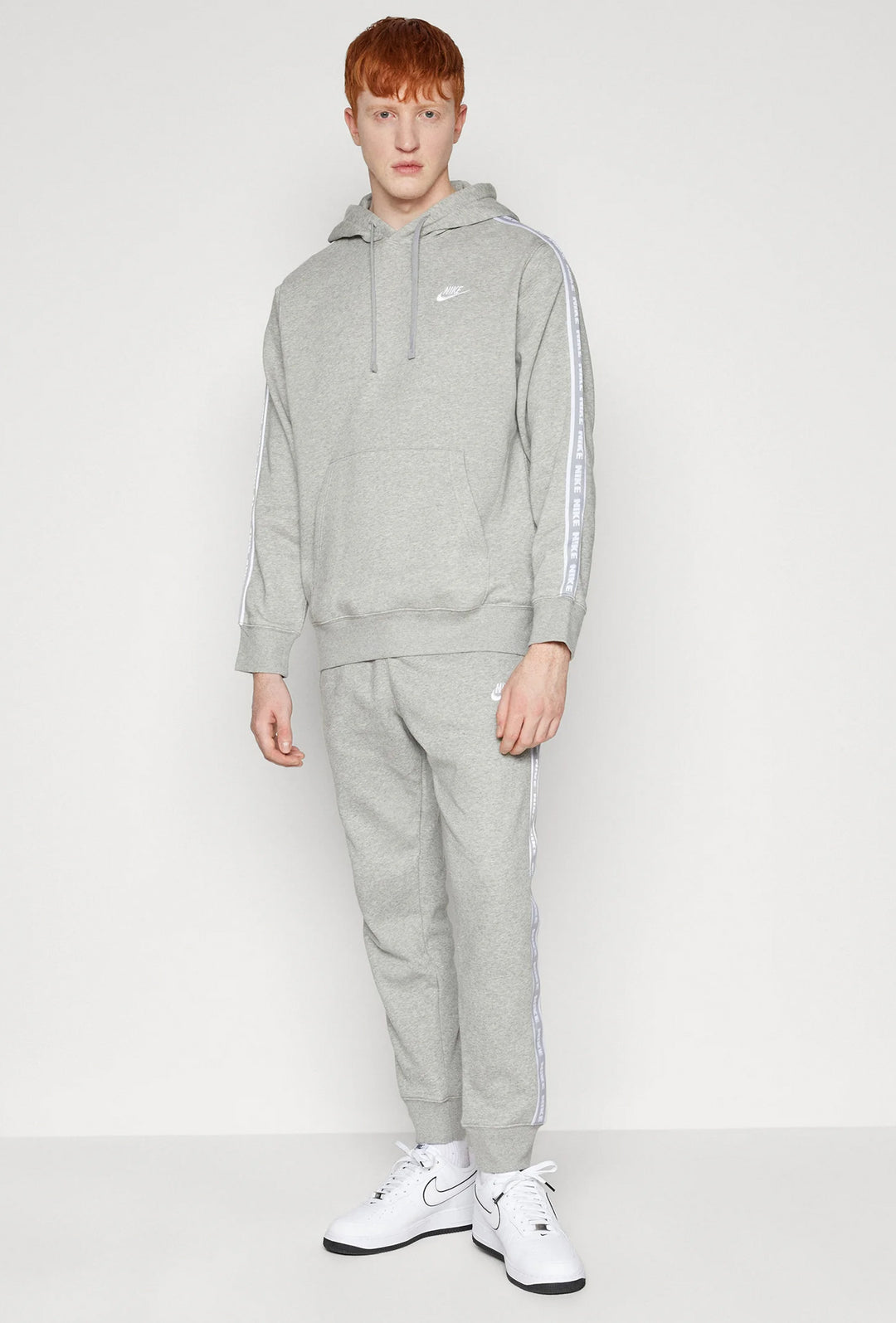 Tuta Uomo NIKE Sportswear modello Club Suite con bande laterali - GRIGIO