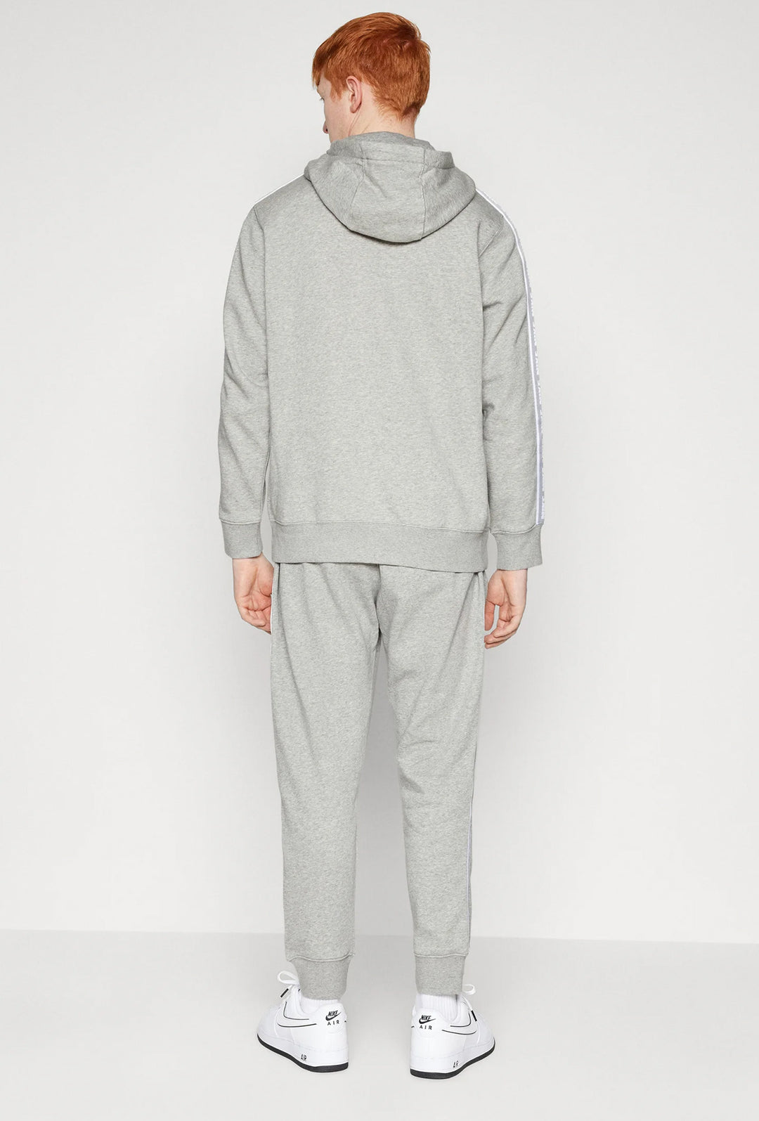 Tuta Uomo NIKE Sportswear modello Club Suite con bande laterali - GRIGIO